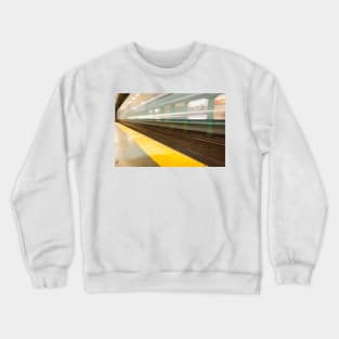 Platform with yellow line railway tracks blurred in motion blur aws train passes. Crewneck Sweatshirt